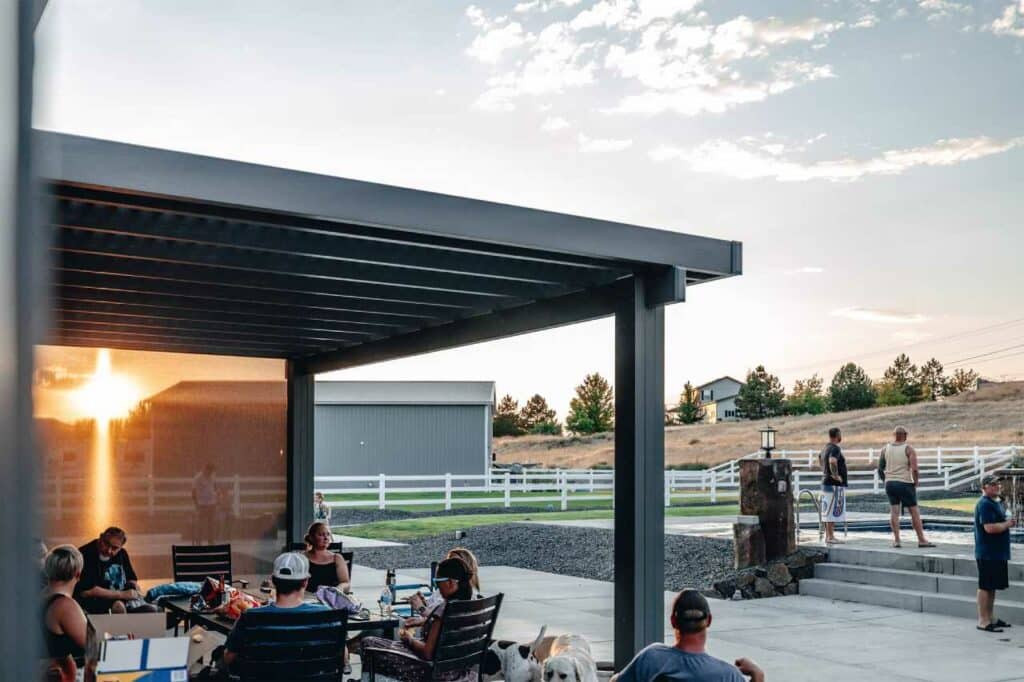 family and friends enjoying an outdoor pergola Patio Covers Unlimited